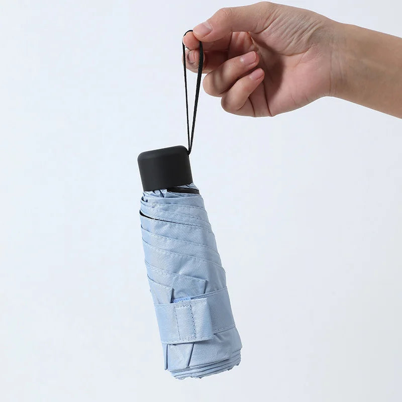 Ultraleve mini bolso feminino pequeno à prova de vento dobrável guarda-chuva viagem compacto chuva guarda-chuva protetor solar ao ar livre um