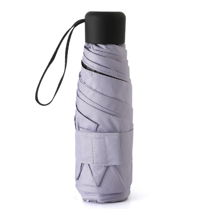 Ultraleve mini bolso feminino pequeno à prova de vento dobrável guarda-chuva viagem compacto chuva guarda-chuva protetor solar ao ar livre um