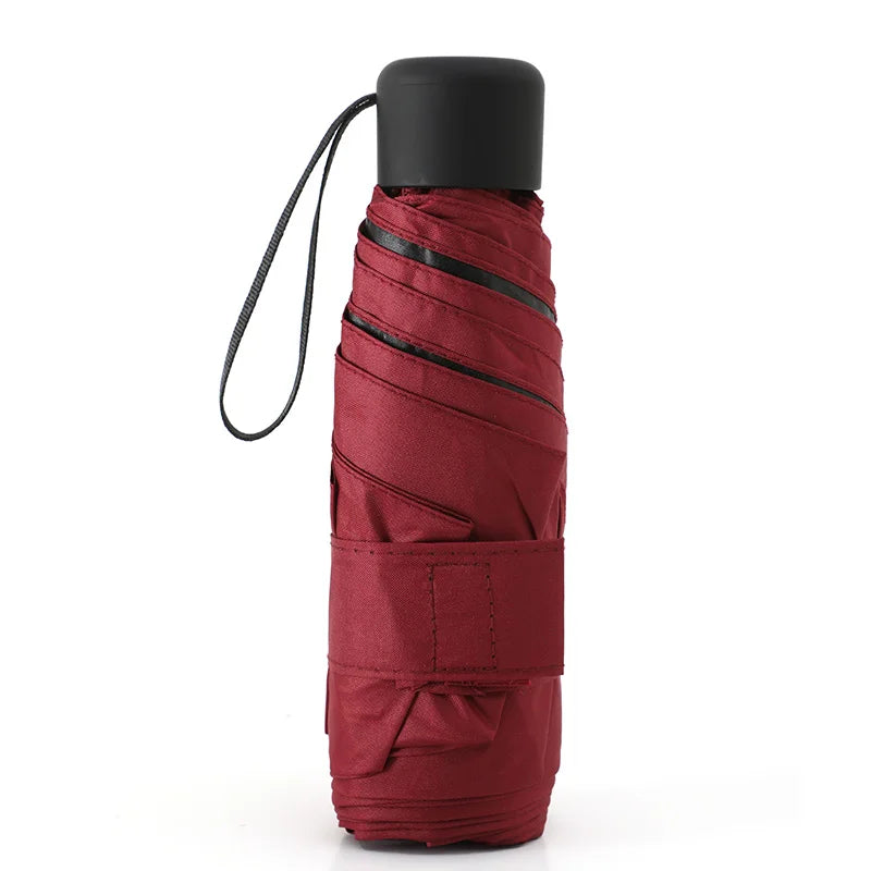 Ultraleve mini bolso feminino pequeno à prova de vento dobrável guarda-chuva viagem compacto chuva guarda-chuva protetor solar ao ar livre um