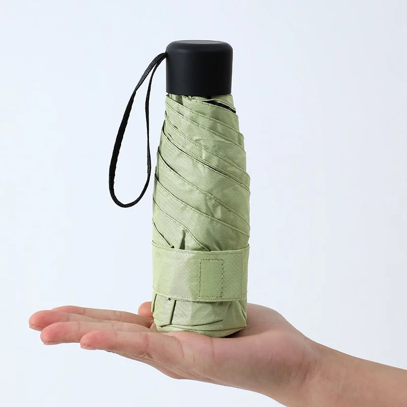 Ultraleve mini bolso feminino pequeno à prova de vento dobrável guarda-chuva viagem compacto chuva guarda-chuva protetor solar ao ar livre um