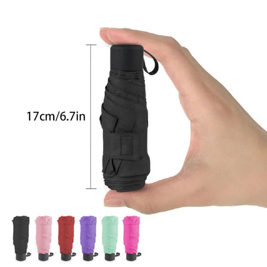 Ultraleve mini bolso feminino pequeno à prova de vento dobrável guarda-chuva viagem compacto chuva guarda-chuva protetor solar ao ar livre um